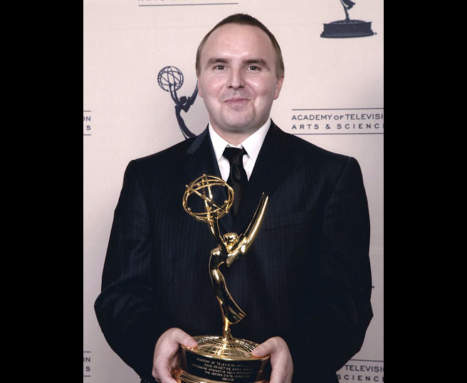 Markus Hagen backstage holding Emmy